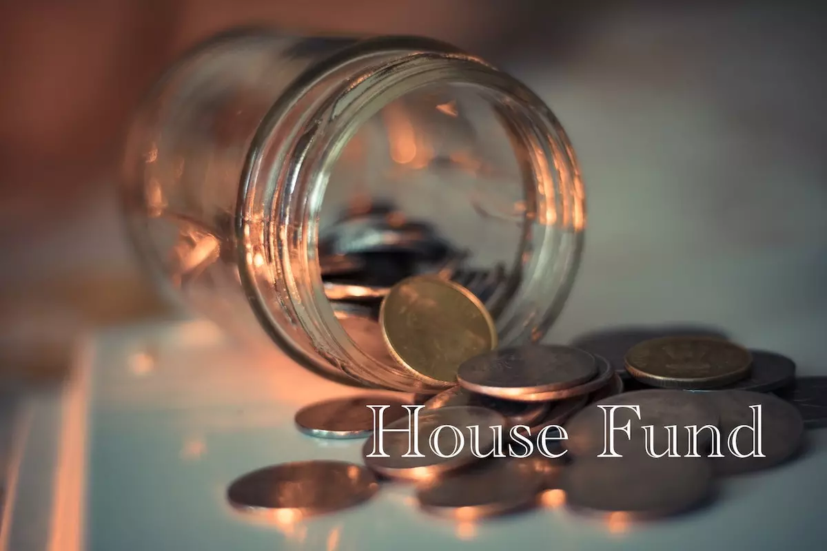 coins spilling out of jar with caption 'house fund'