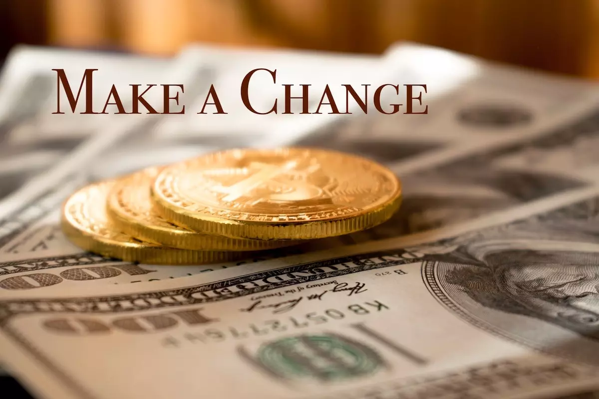 make a change slogan with dollars and coins as a backdrop