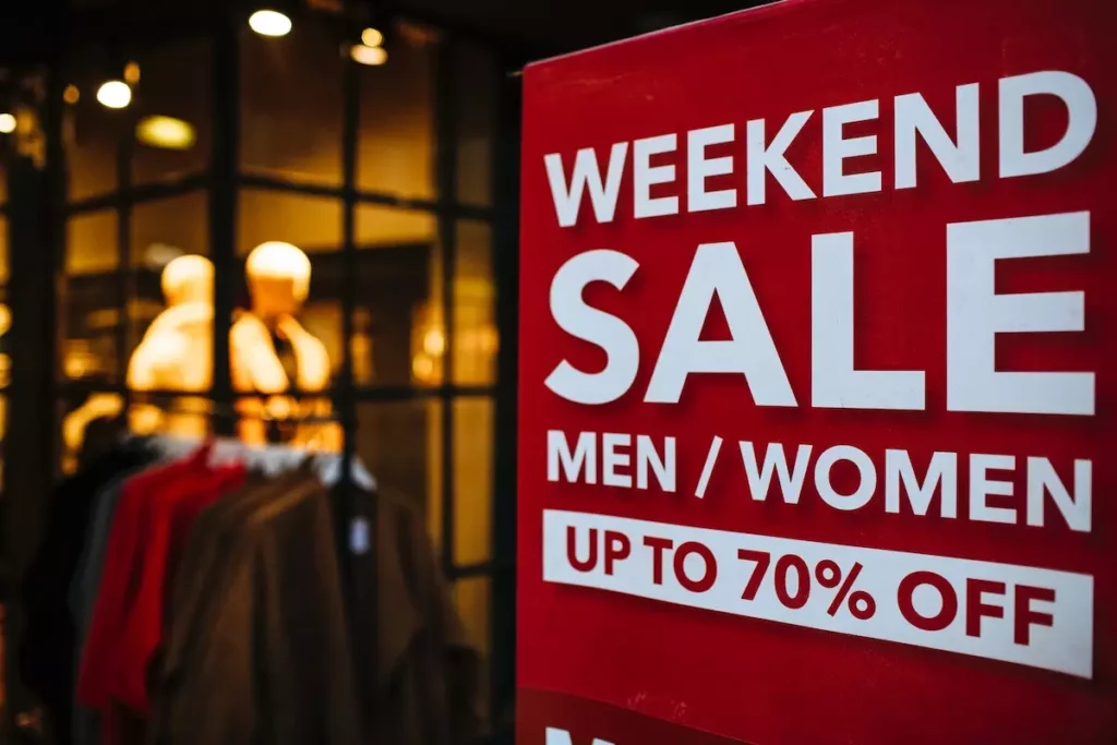shop displaying weekend sale signage 70% off