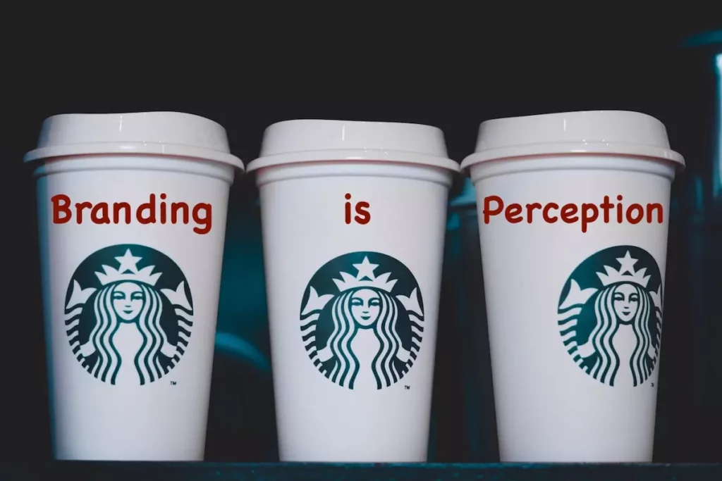 Image of 3 Starbuck's cups with the words 'Branding is Perception' on the cups.