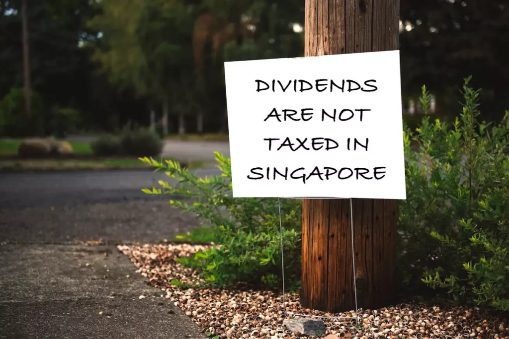 Image of street sign with words, 'Dividends are not taxed in Singapore'.