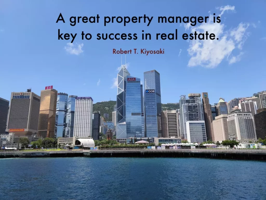 Image of beautiful city line of office buildings with the quote: A great property manager is key to success in real estate - Robert T. Kiyosaki.