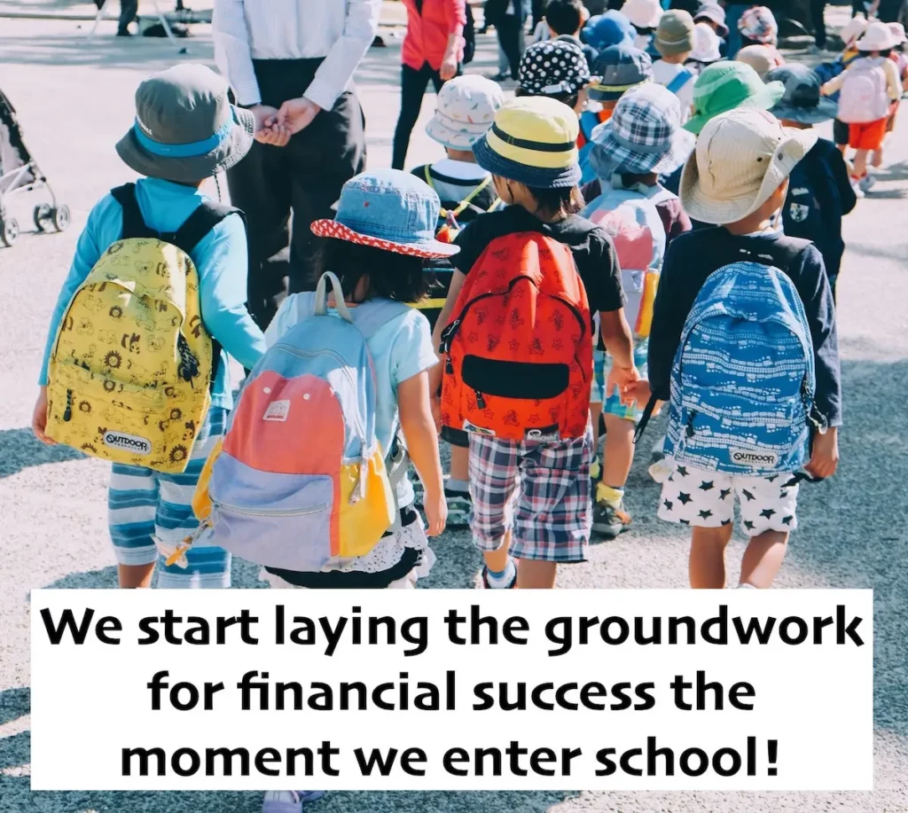 Image of Japanese pre-school kids holding hands and walking in unison with the text overlay: we start laying the groundwork for financial success the moment we enter school!