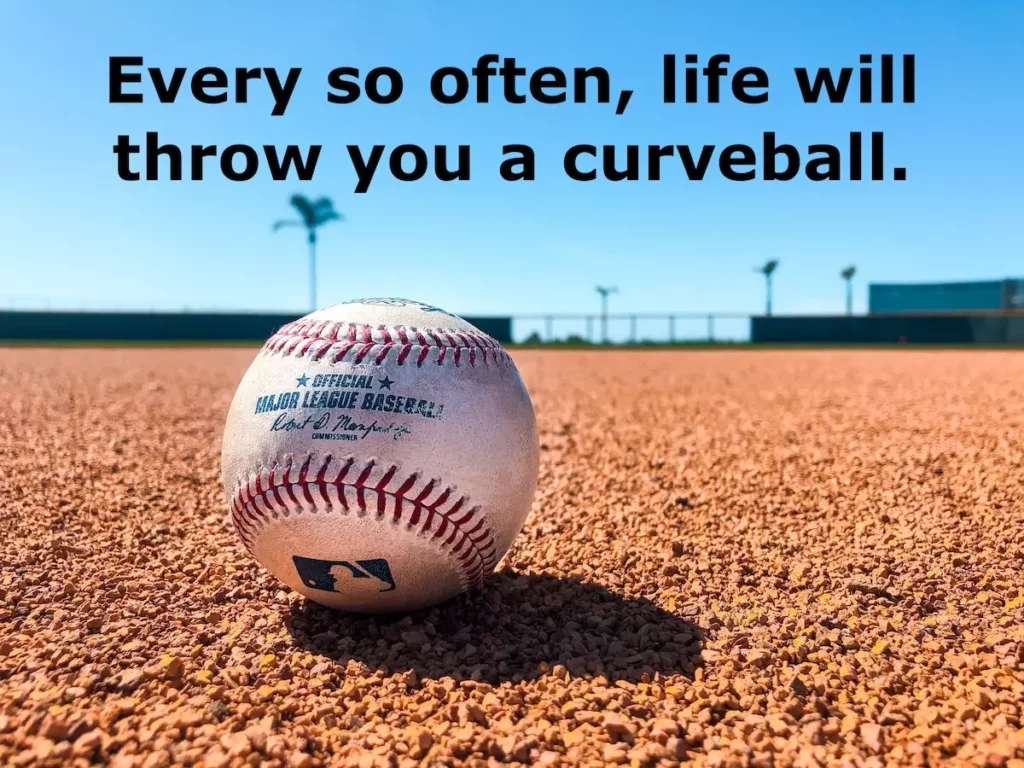 Close up image of a baseball on the ground with the text overlay: every so often, life will throw you a curveball.