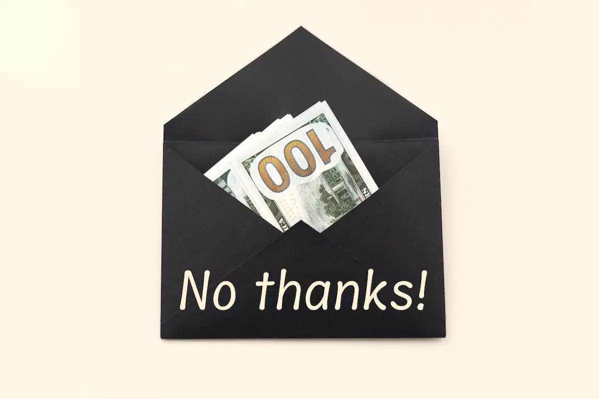 Image of dollar bills in an envelope with the text overlay: No thanks!