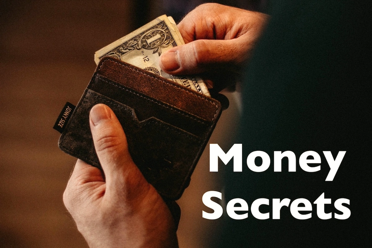Image of someone taking cash of his wallet with the text overlay: Money Secrets.